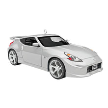 Load image into Gallery viewer, Silver model car on a white background