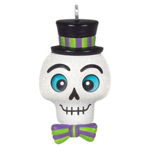 Load image into Gallery viewer, Halloween-themed ornament with a skull face, top hat, and bow tie on a white background