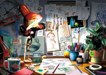 Load image into Gallery viewer, Disney Pixar: The Artist's Desk - 1000 Piece Puzzle By Ravensburger