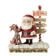 Load image into Gallery viewer, Rudolph and Santa Next to Sign Rudolph Traditions by Jim Shore
