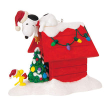 Load image into Gallery viewer, The Peanuts® Gang Deck the Doghouse Musical Ornament With Light
