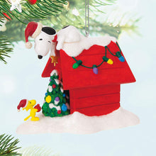 Load image into Gallery viewer, The Peanuts® Gang Deck the Doghouse Musical Ornament With Light
