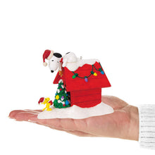 Load image into Gallery viewer, The Peanuts® Gang Deck the Doghouse Musical Ornament With Light
