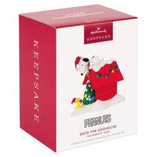 Load image into Gallery viewer, The Peanuts® Gang Deck the Doghouse Musical Ornament With Light
