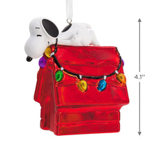 Load image into Gallery viewer, Peanuts® Snoopy on Holiday Doghouse Blown Glass Hallmark Ornament
